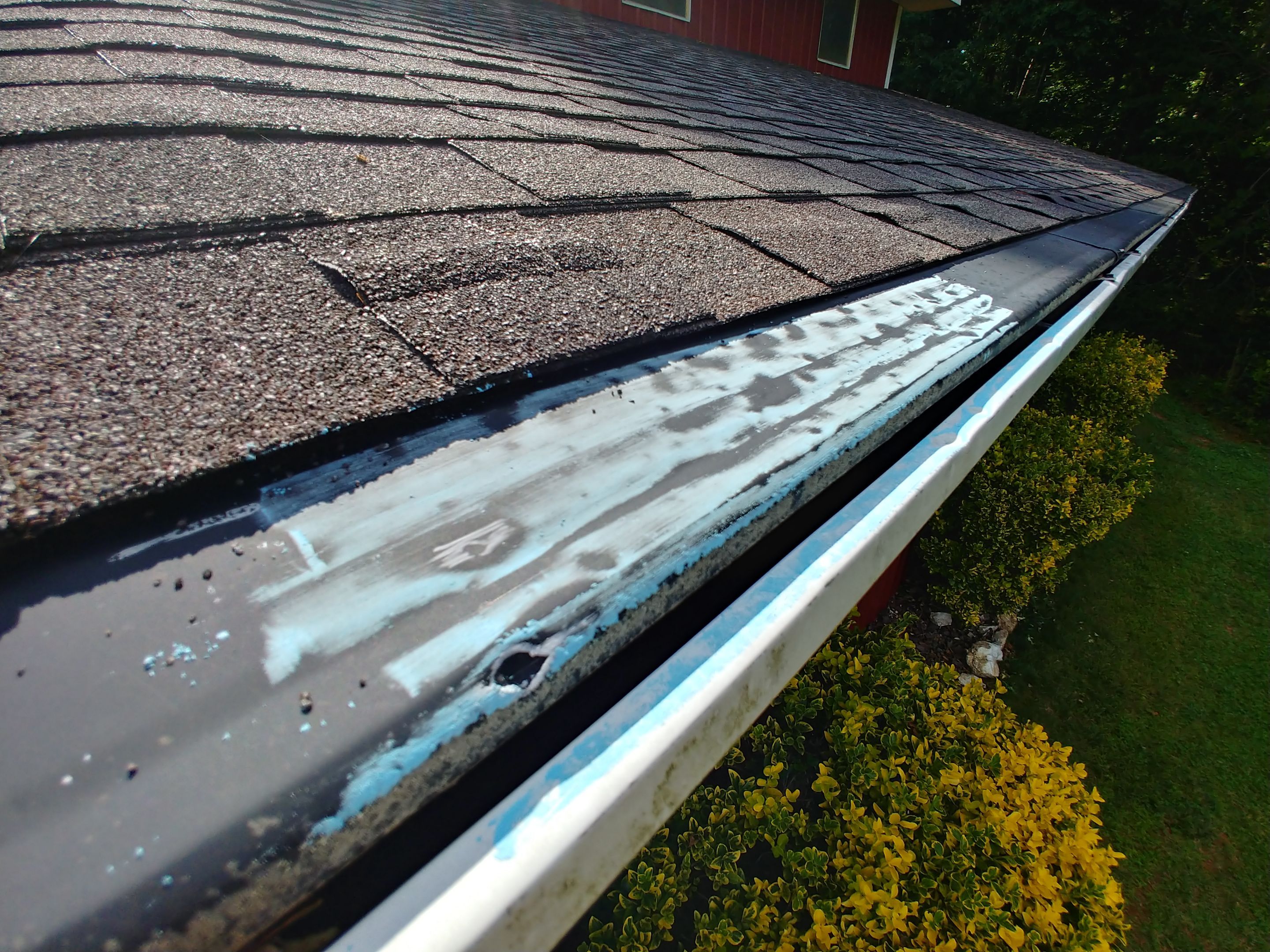 Hail damage to gutter toppers